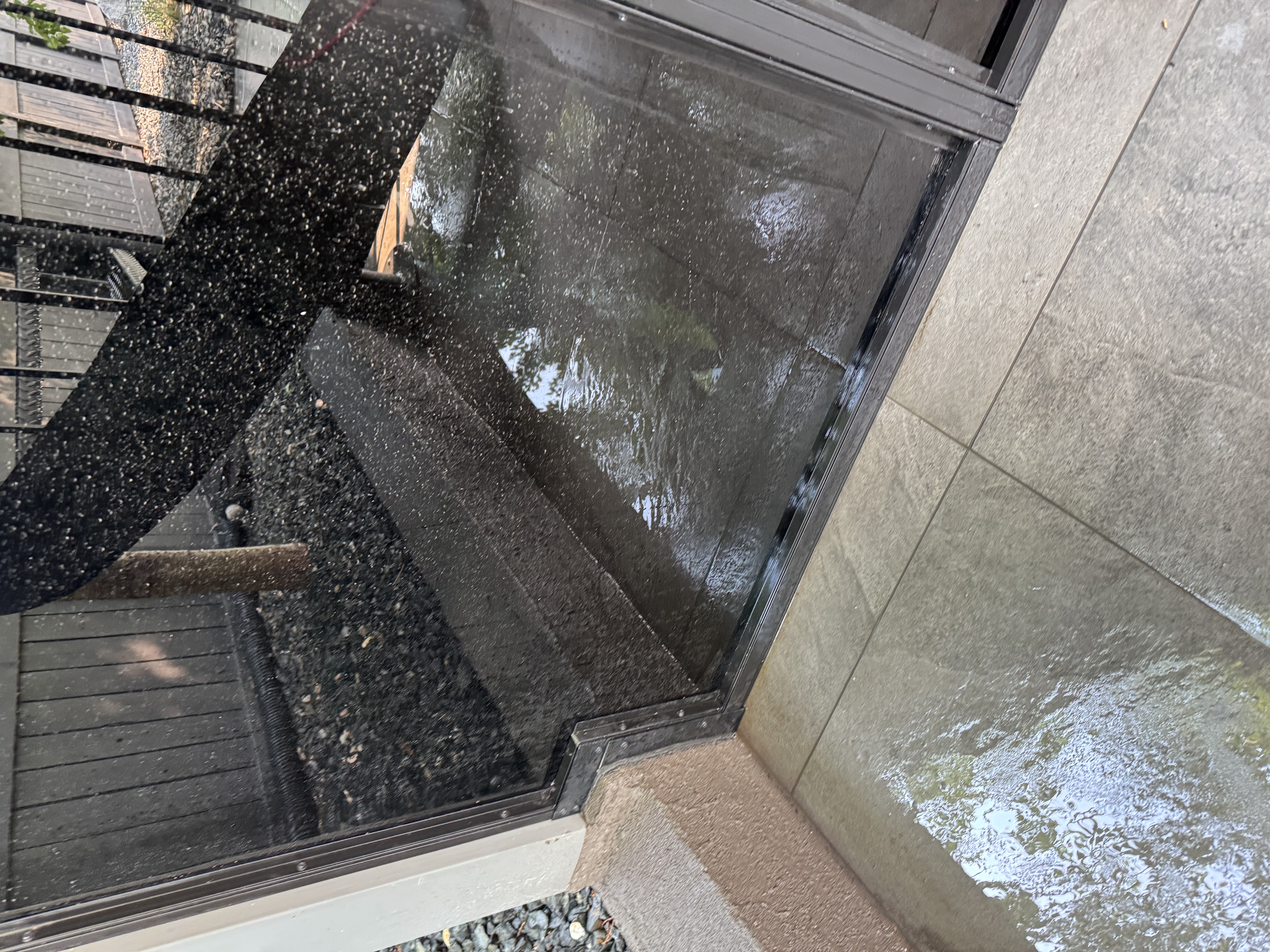 High glass entryway before cleaning